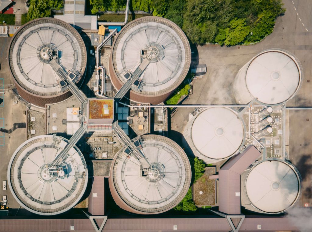 Sewage wastewater treatment plant from above - Evogen Biogas Additive: Turning human waste into renewable energy in wastewater treatment